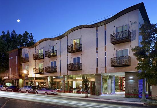 Building with cars parked in front